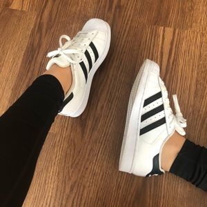 White/ black Adidas superstar